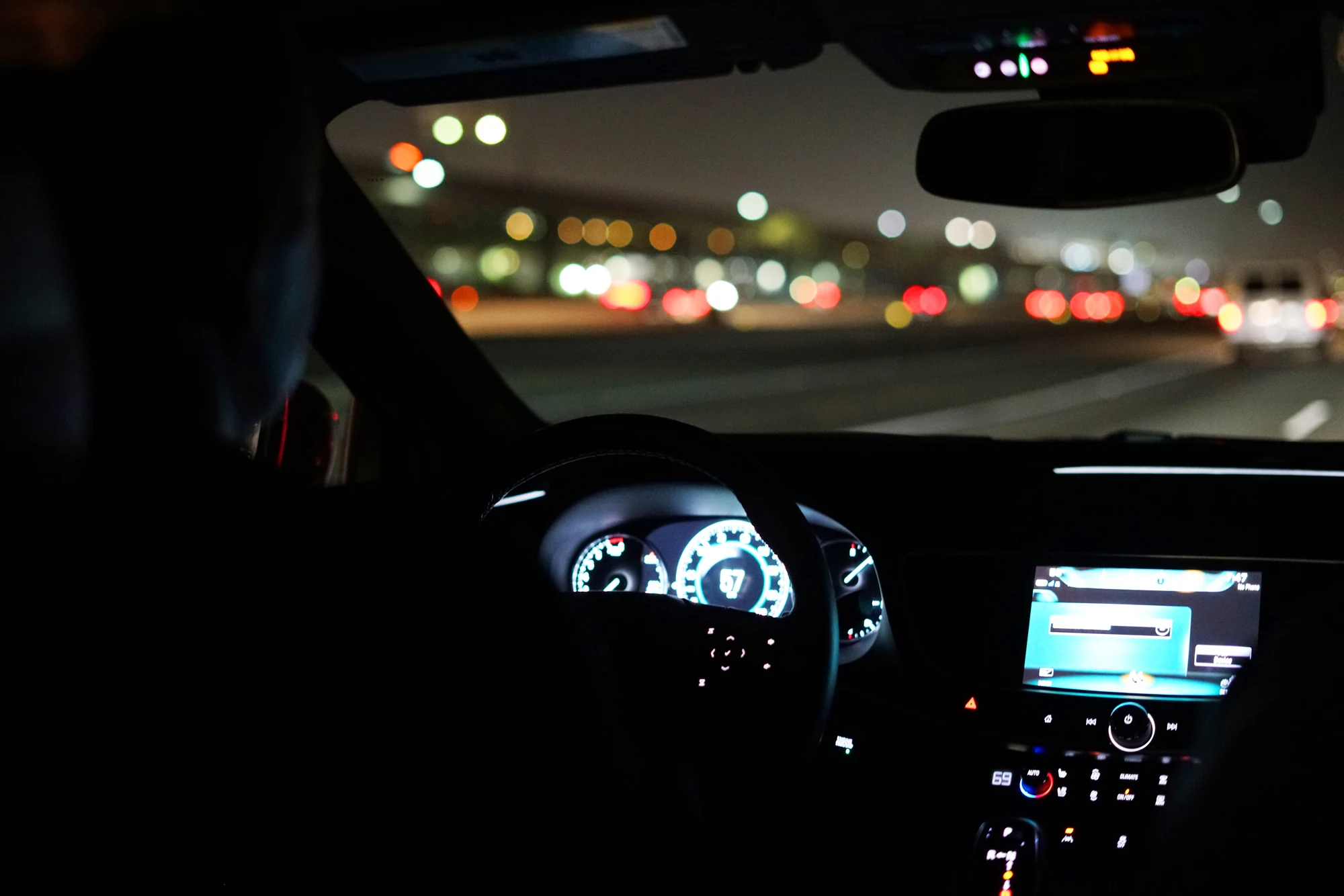 Night driving on an illuminated roadway
